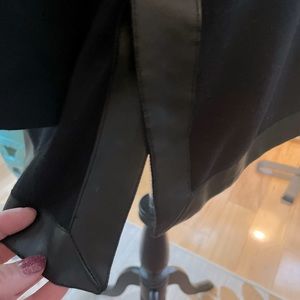 Soft Surrounding sweater.  Black with “pleather”accents. Size Large.